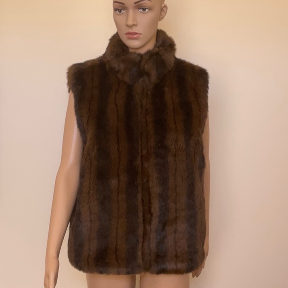 Faux fur and leather vest, reversible,zipper closure and pockets on both sides